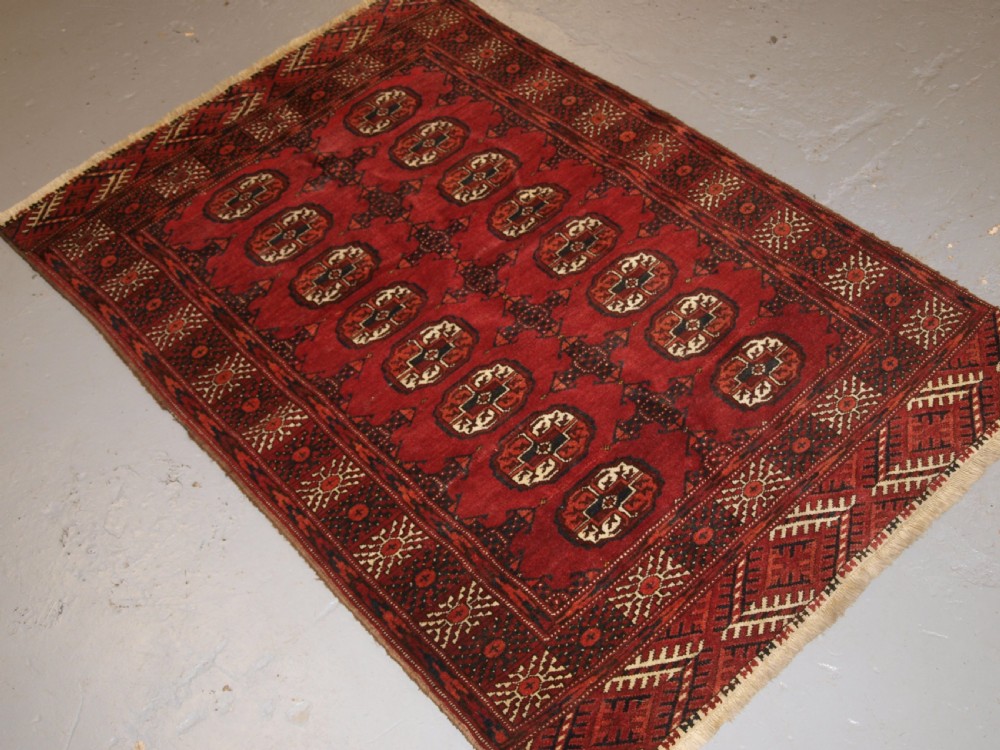 OLD AFGHAN RUG OF SMALL SIZE WITH TEKKE TURKMEN DESIGN, HARD WEARING, CIRCA 1920. View II