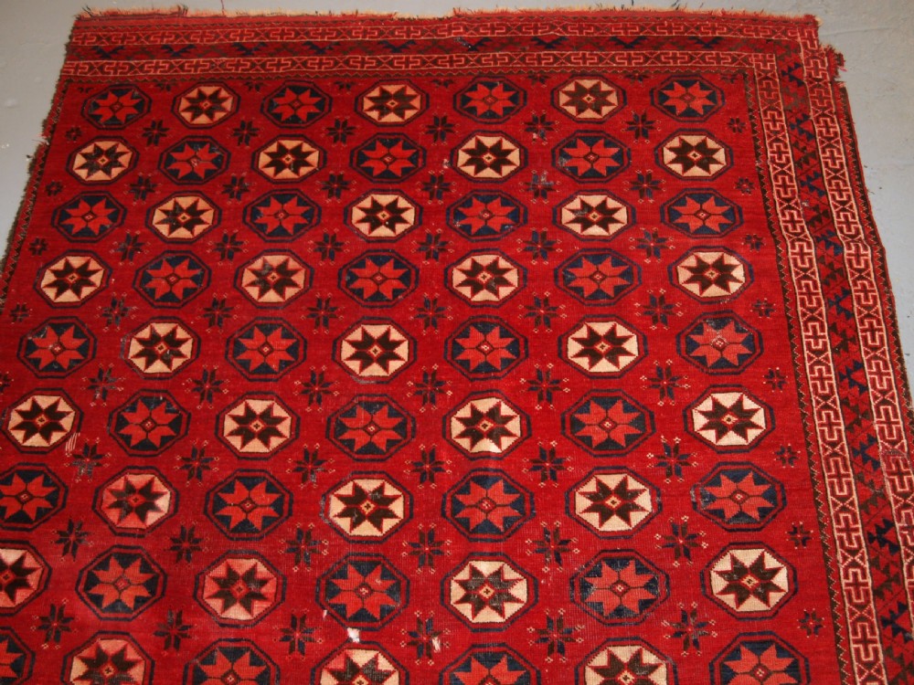 ANTIQUE ERSARI TURKMEN MAIN CARPET FRAGMENT, UNUSUAL STAR DESIGN, 2ND HALF 19TH CENTURY. View IV