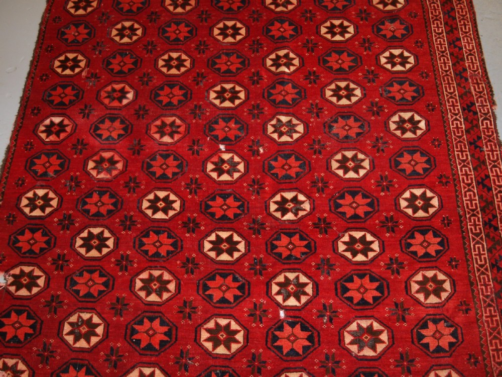 ANTIQUE ERSARI TURKMEN MAIN CARPET FRAGMENT, UNUSUAL STAR DESIGN, 2ND HALF 19TH CENTURY. View V