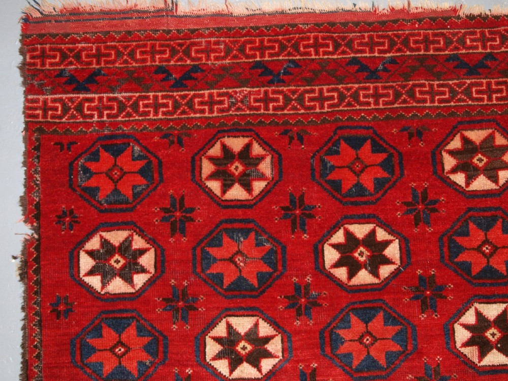 ANTIQUE ERSARI TURKMEN MAIN CARPET FRAGMENT, UNUSUAL STAR DESIGN, 2ND HALF 19TH CENTURY. View VII