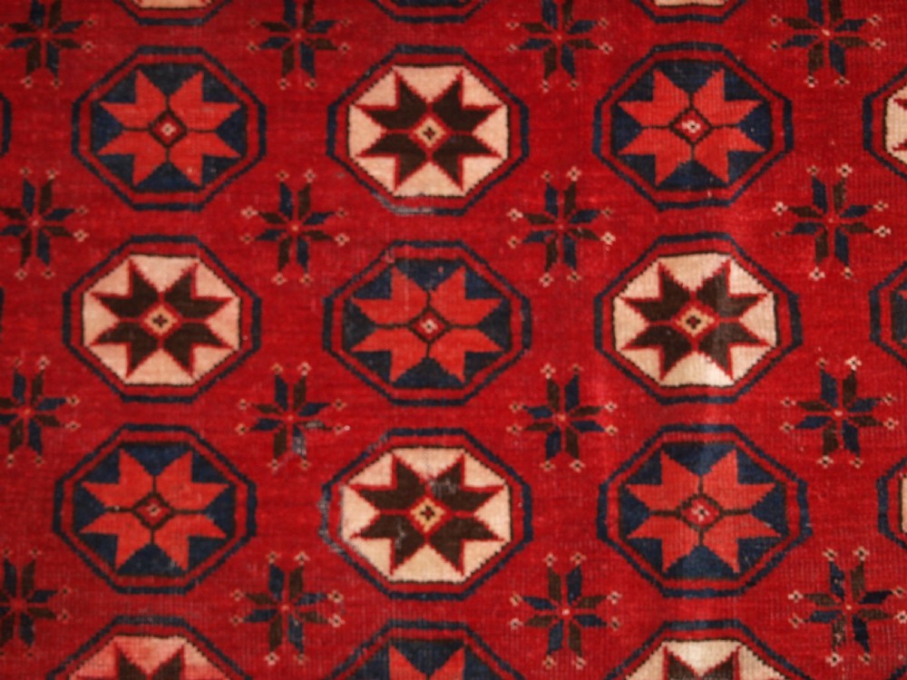 ANTIQUE ERSARI TURKMEN MAIN CARPET FRAGMENT, UNUSUAL STAR DESIGN, 2ND HALF 19TH CENTURY. View VIII