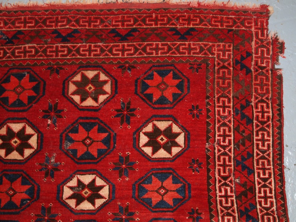 ANTIQUE ERSARI TURKMEN MAIN CARPET FRAGMENT, UNUSUAL STAR DESIGN, 2ND HALF 19TH CENTURY. View IX