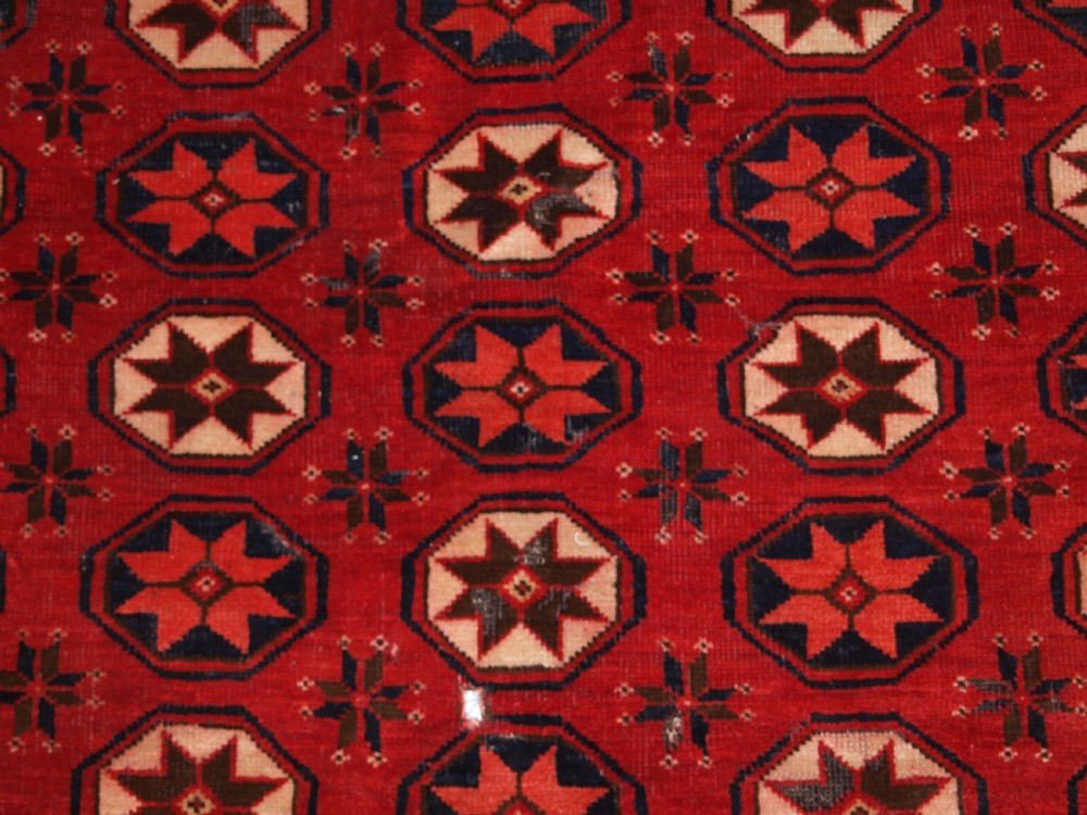 ANTIQUE ERSARI TURKMEN MAIN CARPET FRAGMENT, UNUSUAL STAR DESIGN, 2ND HALF 19TH CENTURY. View X