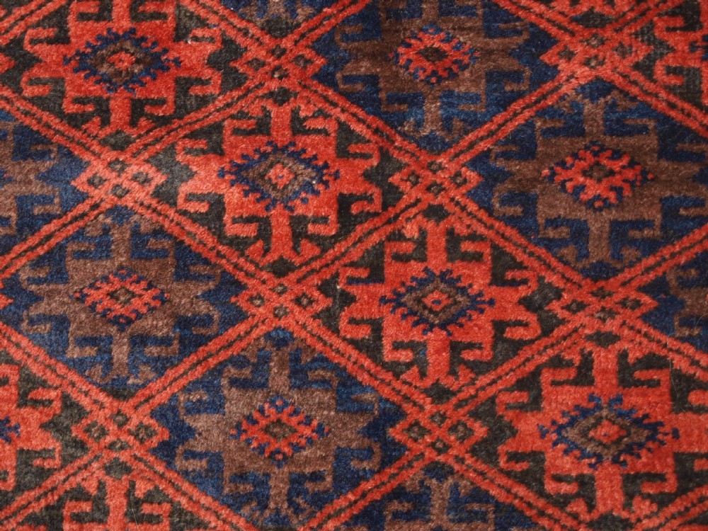 ANTIQUE BALUCH RUG WITH LATTICE DESIGN, STAR BORDER, CIRCA 1900. View VII