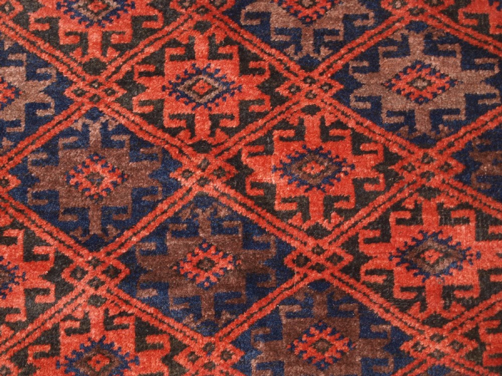 ANTIQUE BALUCH RUG WITH LATTICE DESIGN, STAR BORDER, CIRCA 1900. View VIII