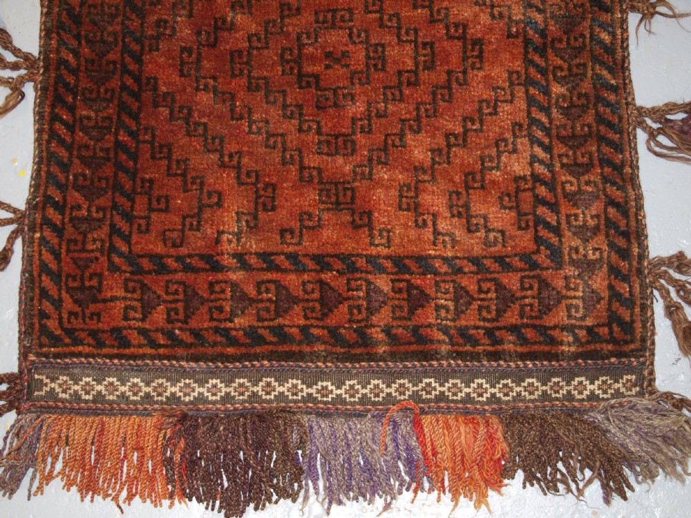 OLD AFGHAN BALUCH BALISHT GRAIN BAG, STRIPPED PLAIN WEAVE BACK, CIRCA 1920. View IV