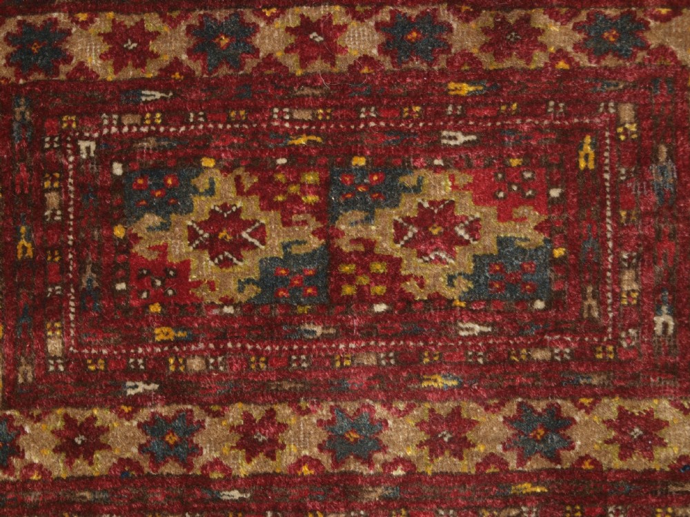 OLD AFGHAN BAG OF SMALL SIZE WITH TURKMEN DESIGN, PLAIN WEAVE BACK, CIRCA 1920. View IV