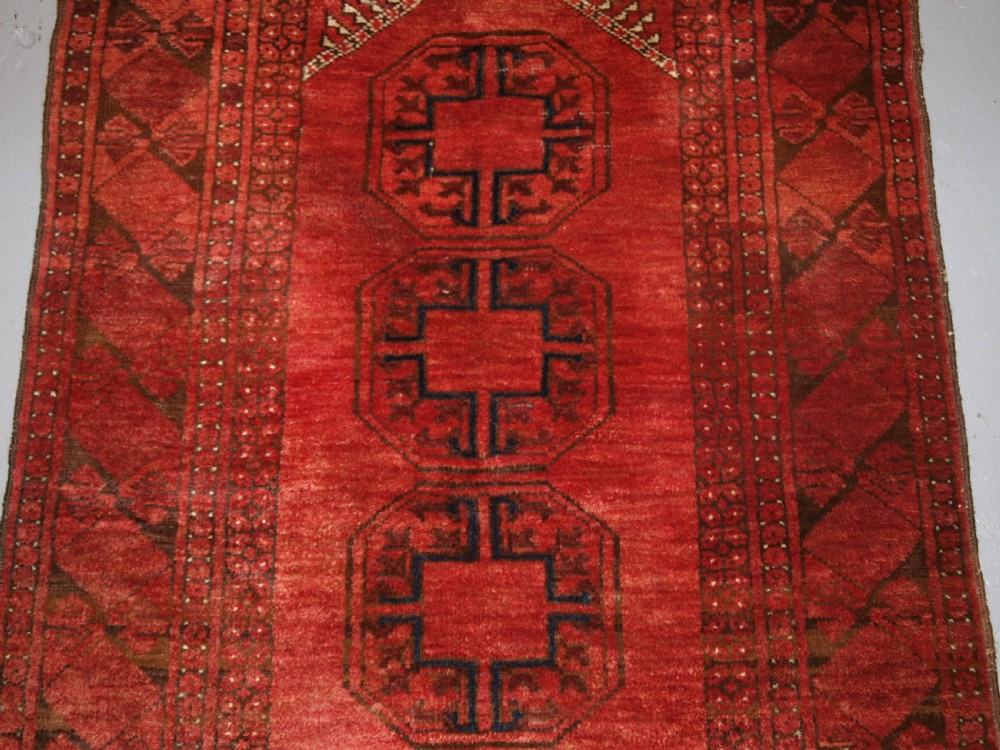 OLD AFGHAN VILLAGE PRAYER RUG WITH TURKMEN DESIGN, RAMS HORN MIHRAB, CIRCA 1920. View III