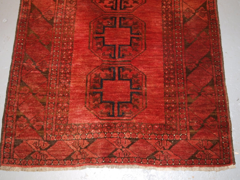 OLD AFGHAN VILLAGE PRAYER RUG WITH TURKMEN DESIGN, RAMS HORN MIHRAB, CIRCA 1920. View IV