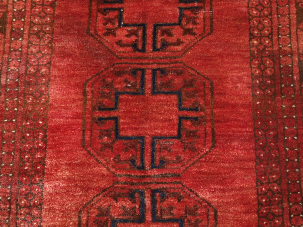 OLD AFGHAN VILLAGE PRAYER RUG WITH TURKMEN DESIGN, RAMS HORN MIHRAB, CIRCA 1920. View VIII