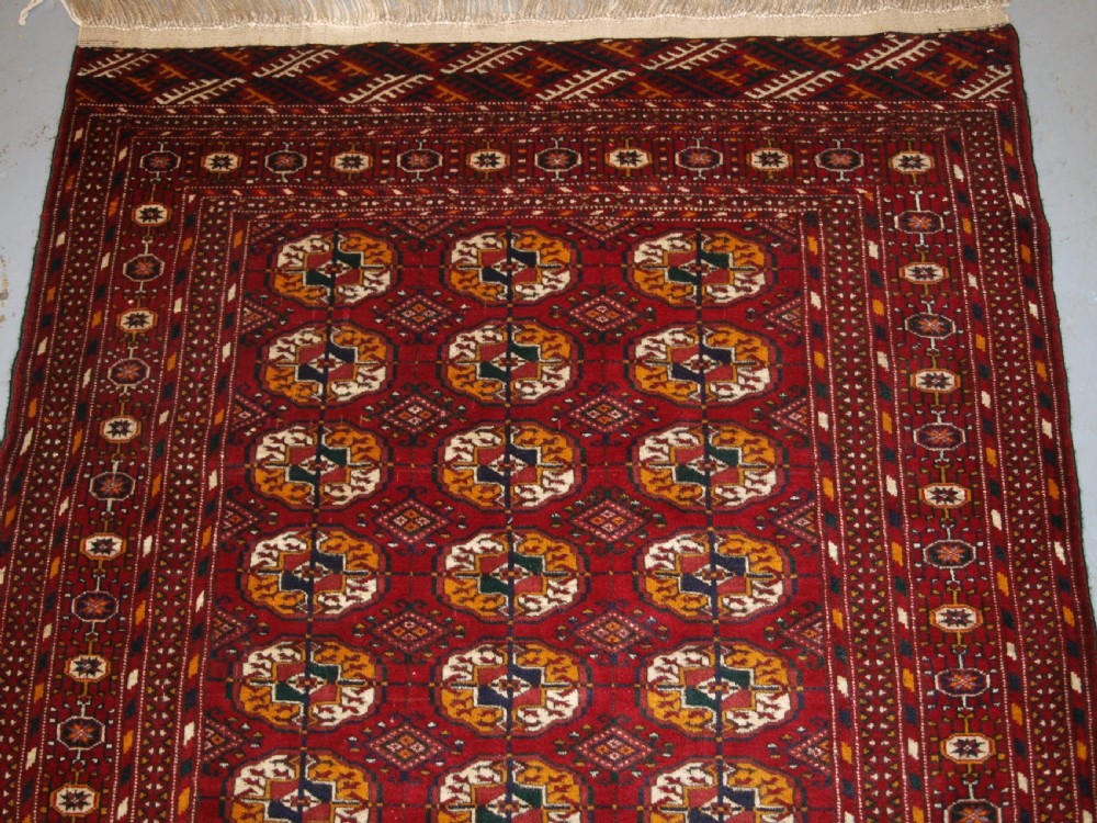 OLD AFGHAN RUG WITH TEKKE TURKMEN DESIGN, FINE WEAVE, CIRCA 1920. View II