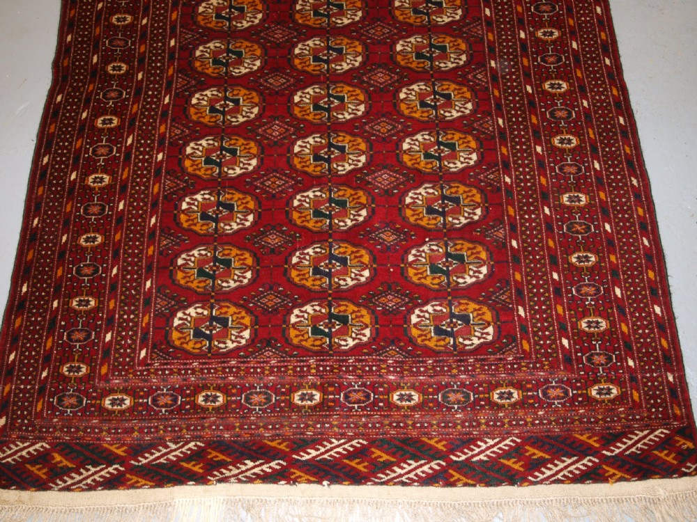 OLD AFGHAN RUG WITH TEKKE TURKMEN DESIGN, FINE WEAVE, CIRCA 1920. View IV