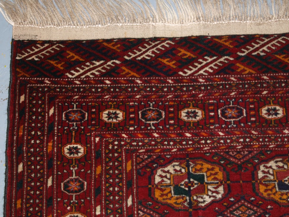 OLD AFGHAN RUG WITH TEKKE TURKMEN DESIGN, FINE WEAVE, CIRCA 1920. View V