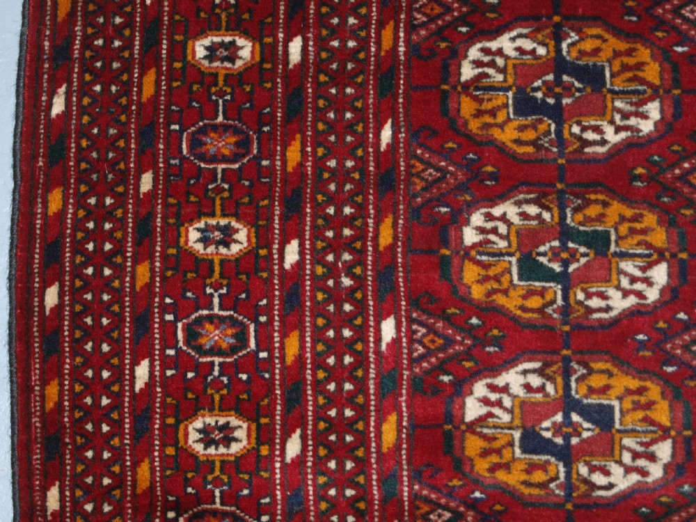 OLD AFGHAN RUG WITH TEKKE TURKMEN DESIGN, FINE WEAVE, CIRCA 1920. View VI