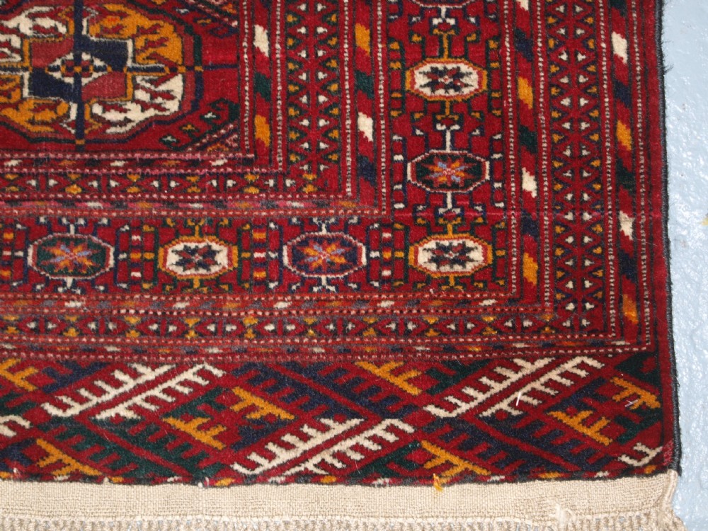 OLD AFGHAN RUG WITH TEKKE TURKMEN DESIGN, FINE WEAVE, CIRCA 1920. View X