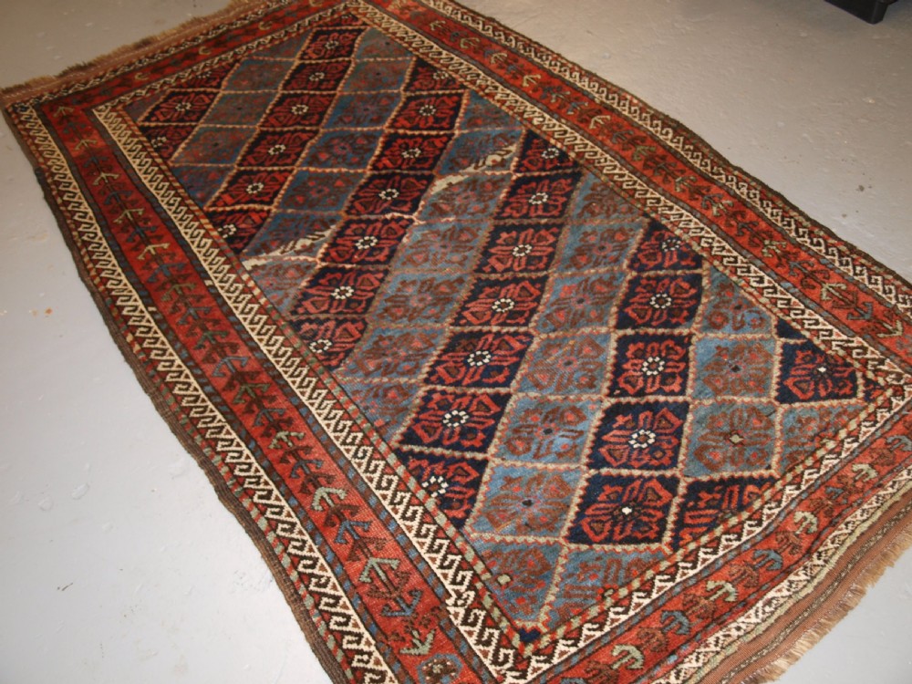 ANTIQUE KORDI RUG, KURDS OF KHORASSAN, LIGHT BLUE GROUND, CIRCA 1900. View II