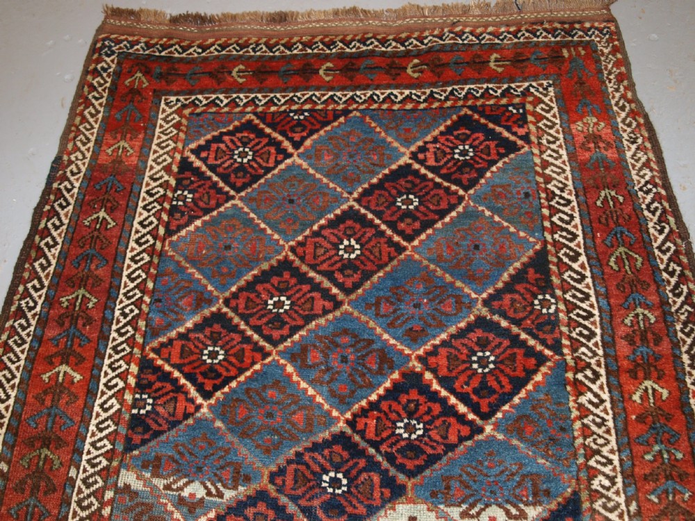 ANTIQUE KORDI RUG, KURDS OF KHORASSAN, LIGHT BLUE GROUND, CIRCA 1900. View III