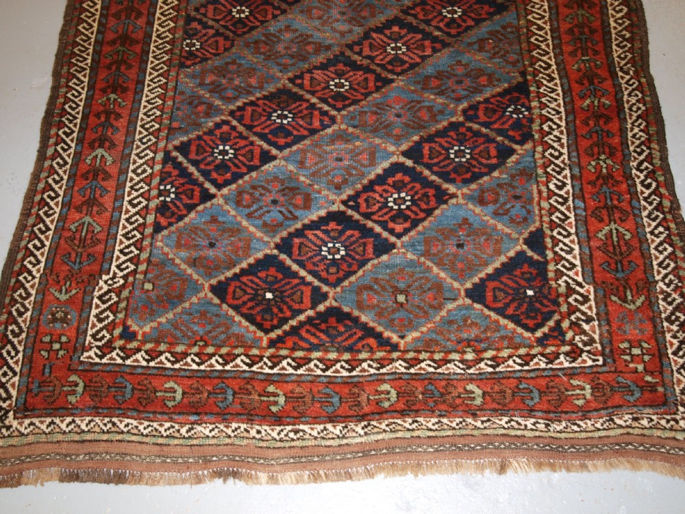 ANTIQUE KORDI RUG, KURDS OF KHORASSAN, LIGHT BLUE GROUND, CIRCA 1900. View V