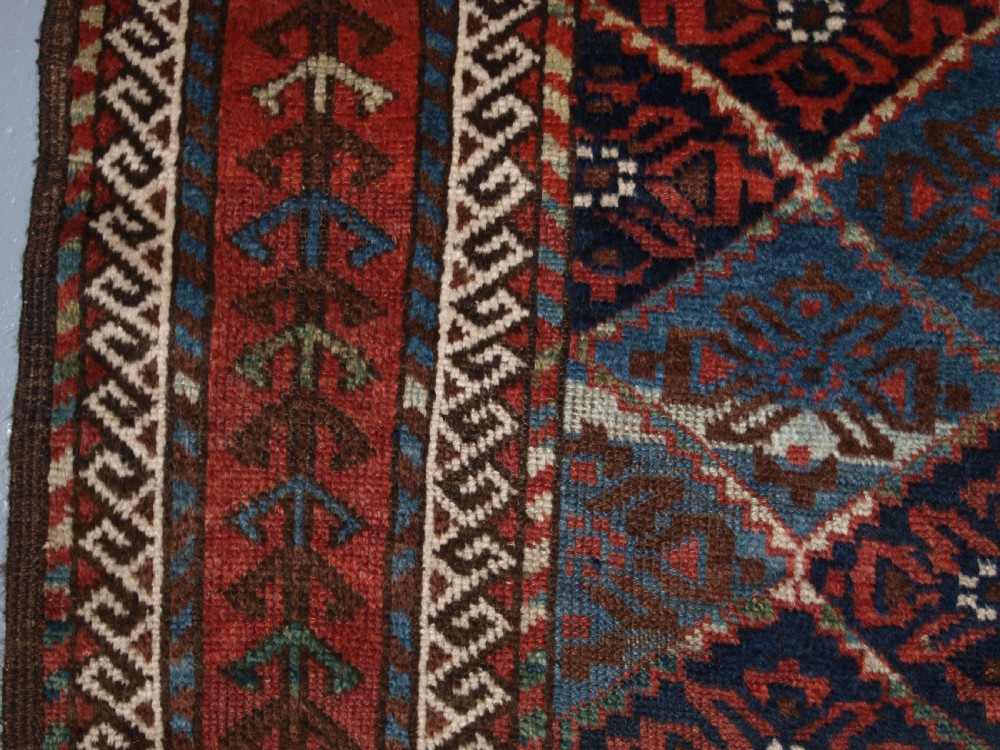 ANTIQUE KORDI RUG, KURDS OF KHORASSAN, LIGHT BLUE GROUND, CIRCA 1900. View VII