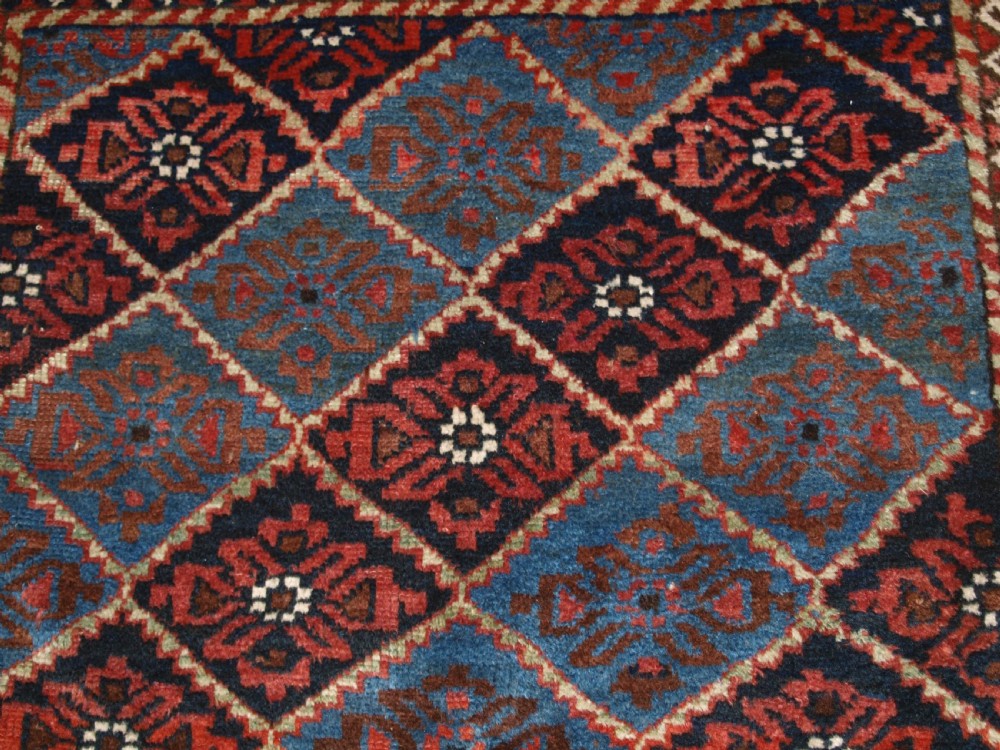 ANTIQUE KORDI RUG, KURDS OF KHORASSAN, LIGHT BLUE GROUND, CIRCA 1900. View VIII