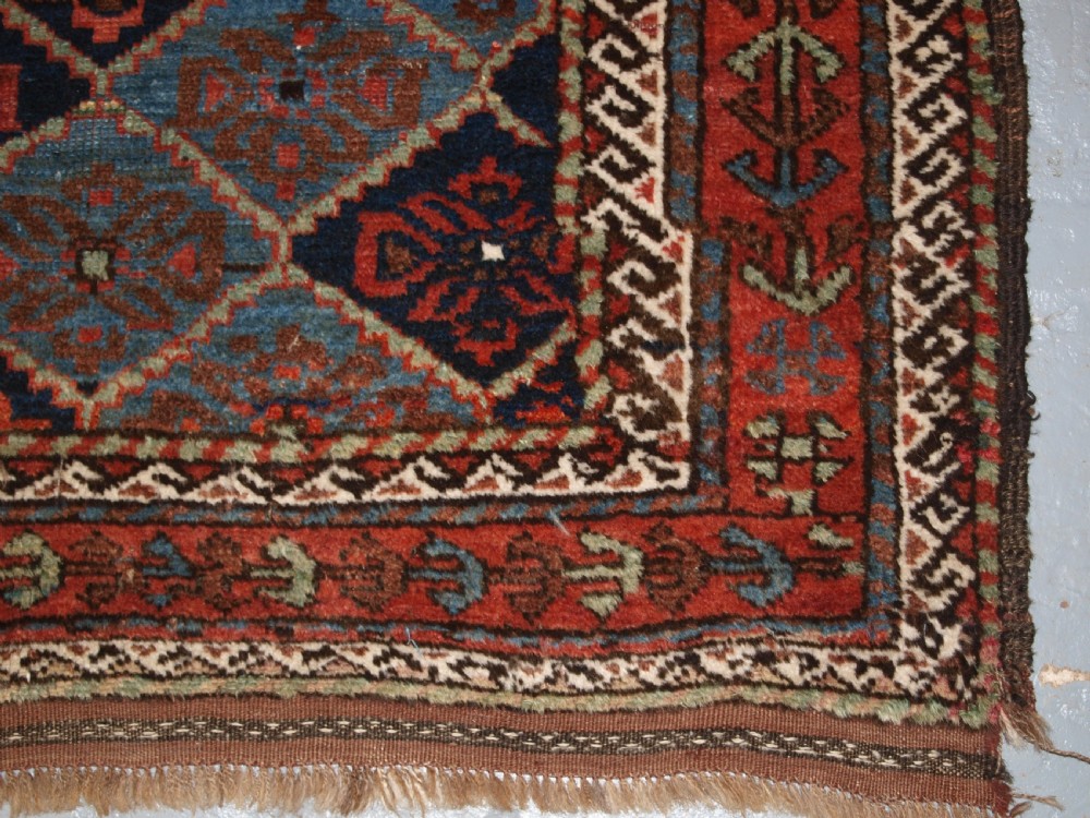 ANTIQUE KORDI RUG, KURDS OF KHORASSAN, LIGHT BLUE GROUND, CIRCA 1900. View X