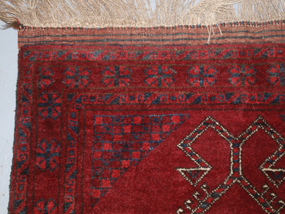 AFGHAN VILLAGE PRAYER RUG WITH RAMS HORN MIHRAB, CIRCA 1920. View V