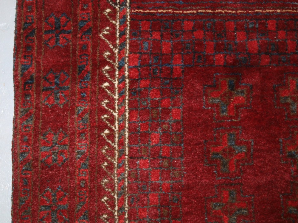 AFGHAN VILLAGE PRAYER RUG WITH RAMS HORN MIHRAB, CIRCA 1920. View VI