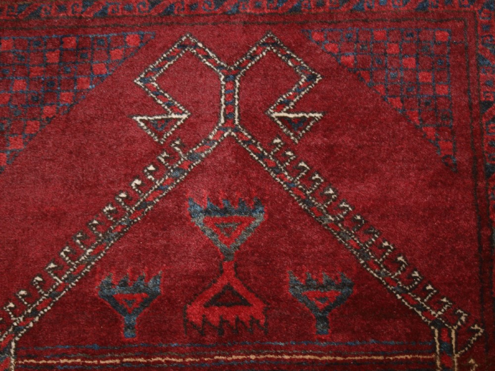 AFGHAN VILLAGE PRAYER RUG WITH RAMS HORN MIHRAB, CIRCA 1920. View VII