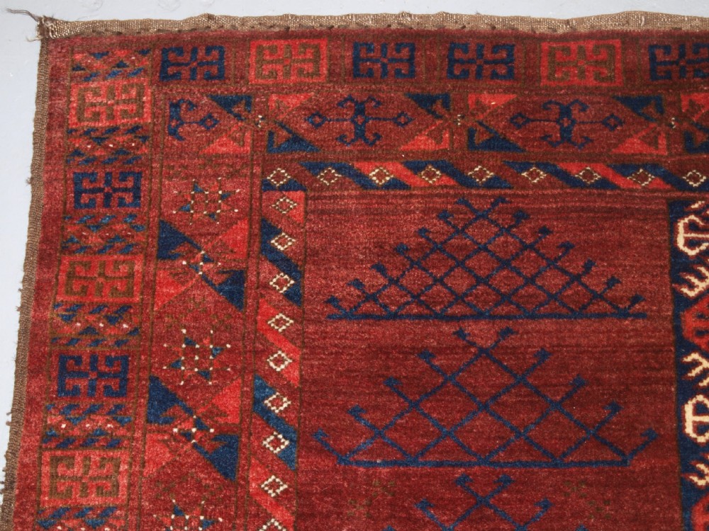 OLD AFGHAN RUG OF ERSARI TURKMEN ENSI DOOR HANGING DESIGN, CIRCA 1920. View III