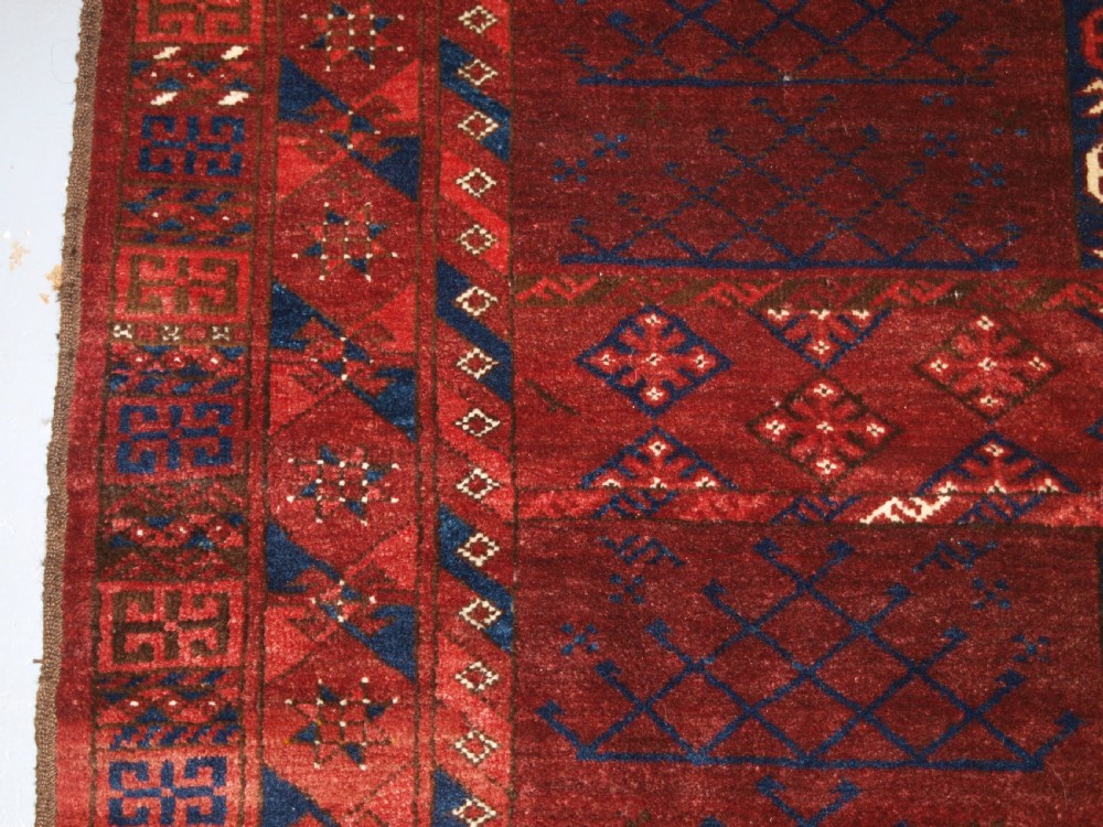 OLD AFGHAN RUG OF ERSARI TURKMEN ENSI DOOR HANGING DESIGN, CIRCA 1920. View IV