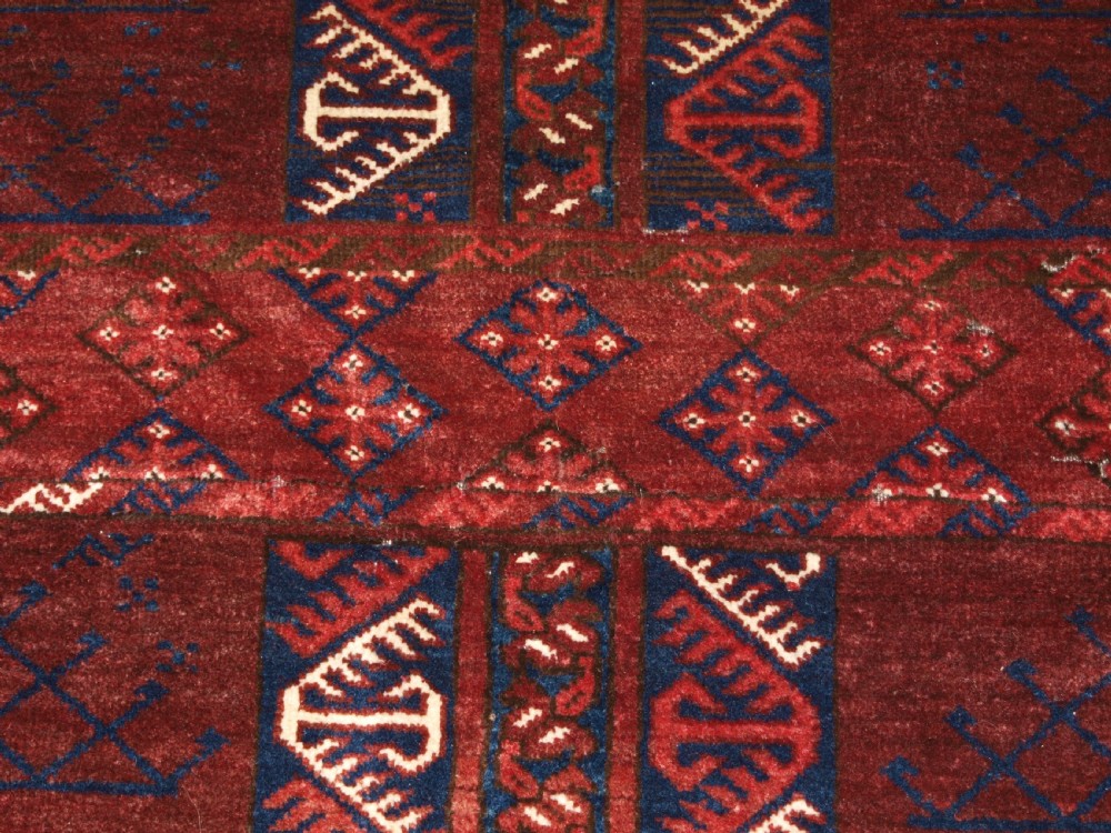 OLD AFGHAN RUG OF ERSARI TURKMEN ENSI DOOR HANGING DESIGN, CIRCA 1920. View VIII