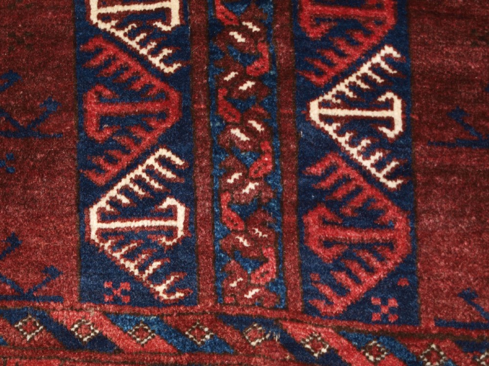 OLD AFGHAN RUG OF ERSARI TURKMEN ENSI DOOR HANGING DESIGN, CIRCA 1920. View IX
