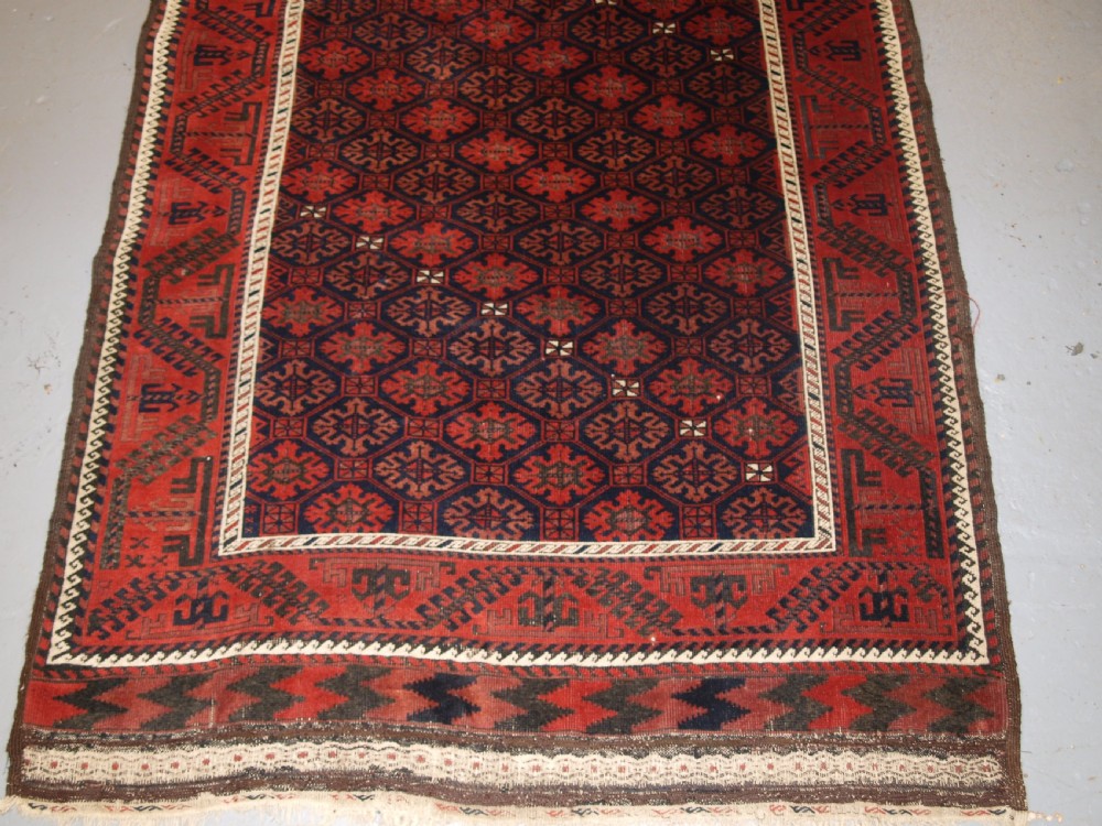ANTIQUE BALUCH RUG, KHORASSAN REGION, EASTERN PERSIA, SNOWFLAKE LATTICE DESIGN, 4TH QUARTER 19TH CENTURY. View IV