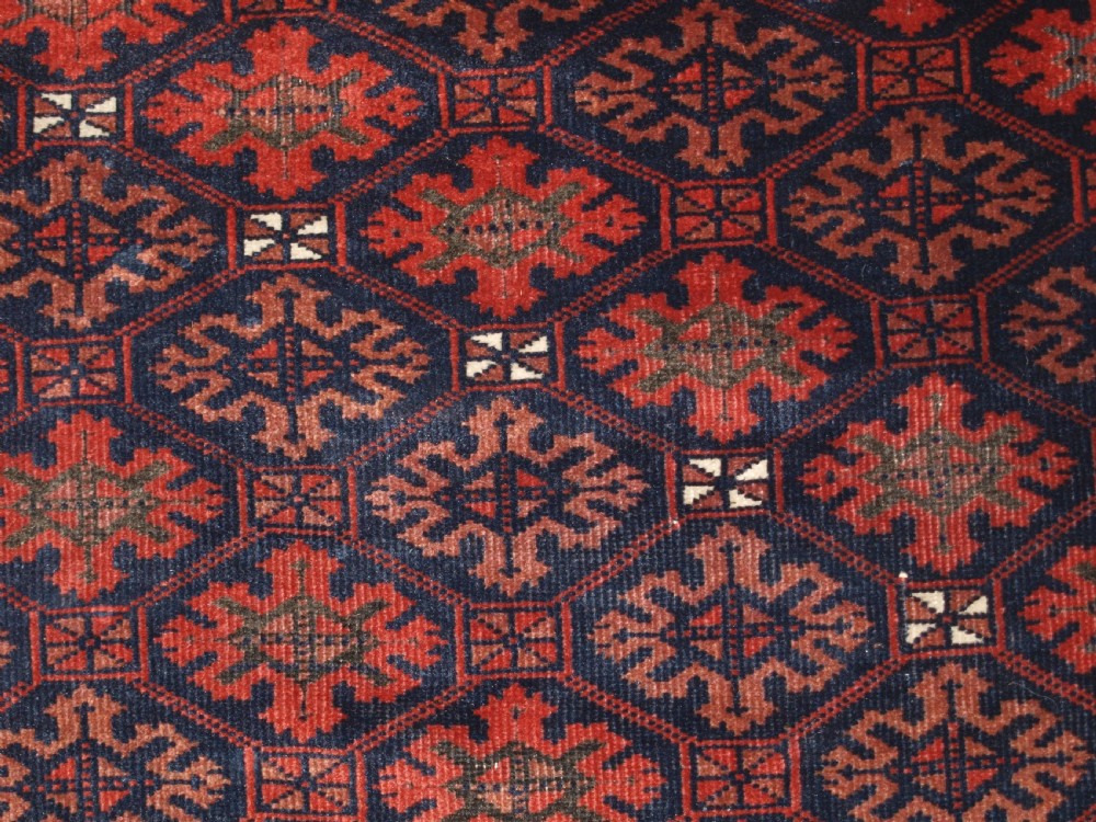 ANTIQUE BALUCH RUG, KHORASSAN REGION, EASTERN PERSIA, SNOWFLAKE LATTICE DESIGN, 4TH QUARTER 19TH CENTURY. View IX