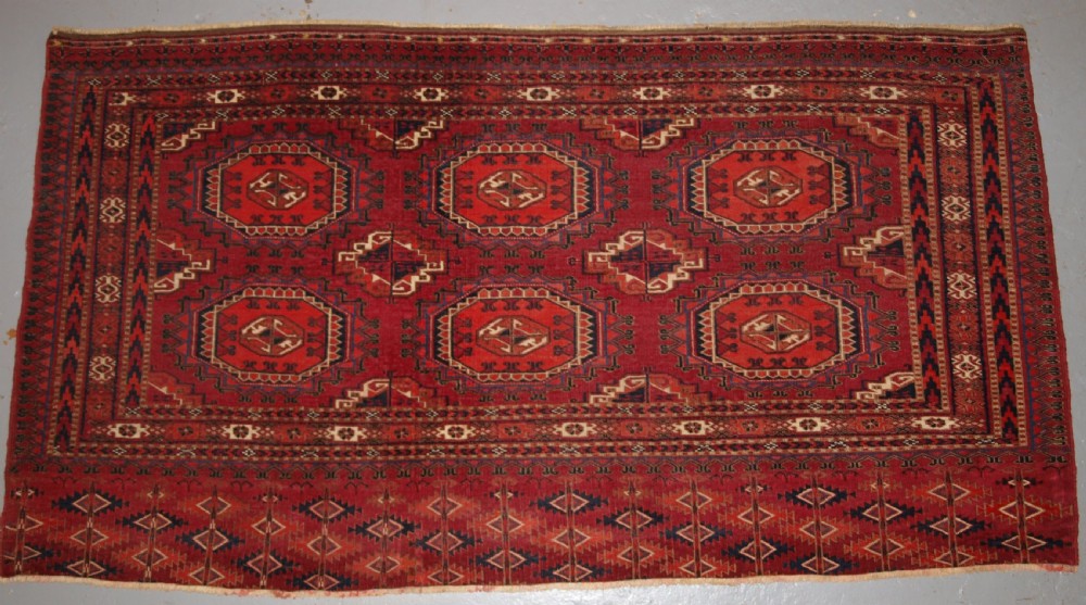 ANTIQUE TEKKE TURKMEN CHUVAL WITH SALOR GULS, VERY FINE WEAVE, CIRCA 1880.