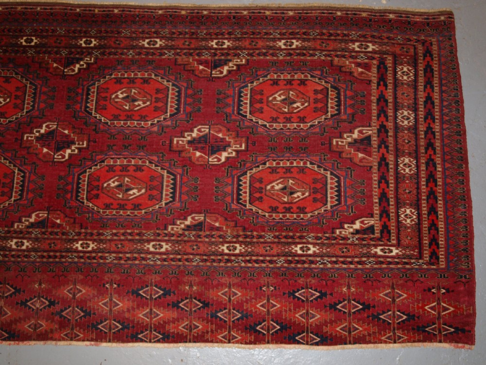 ANTIQUE TEKKE TURKMEN CHUVAL WITH SALOR GULS, VERY FINE WEAVE, CIRCA 1880. View III