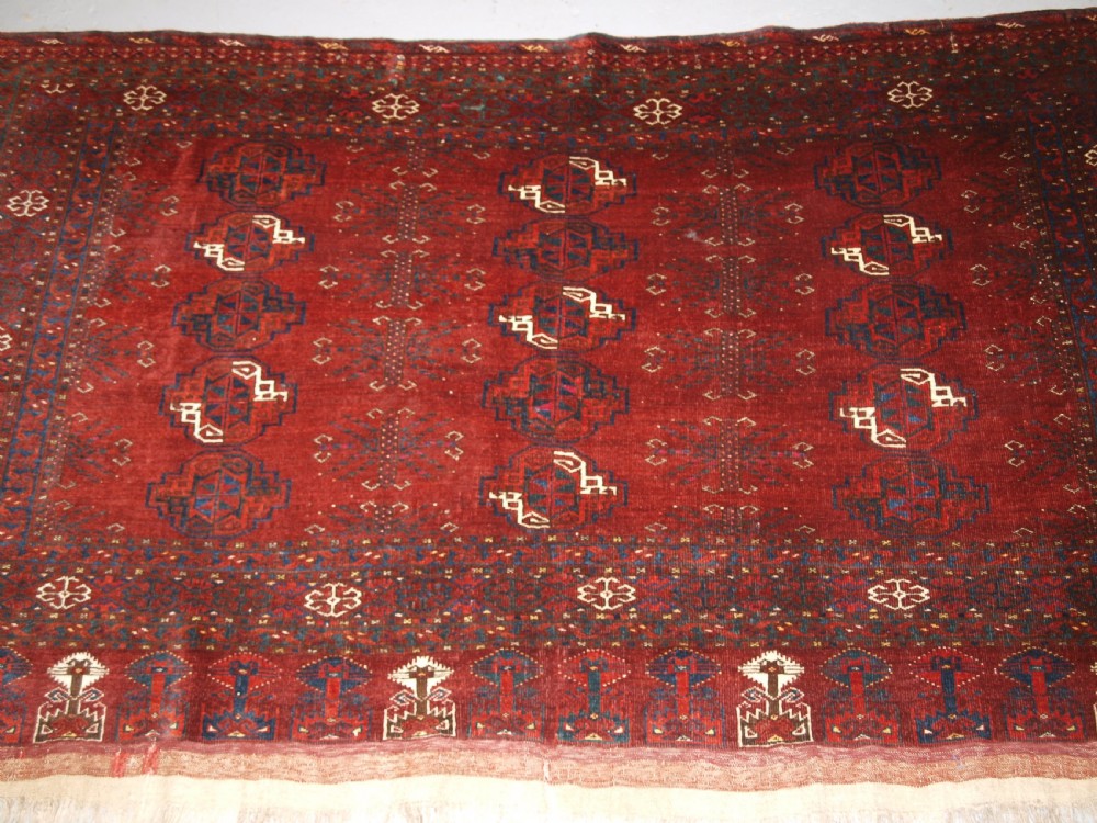 ANTIQUE ERSARI TURKMEN CHUVAL WITH 15 GULS AND GOOD TREE ELEM DESIGN, CIRCA 1900. View III