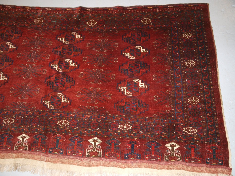 ANTIQUE ERSARI TURKMEN CHUVAL WITH 15 GULS AND GOOD TREE ELEM DESIGN, CIRCA 1900. View IV
