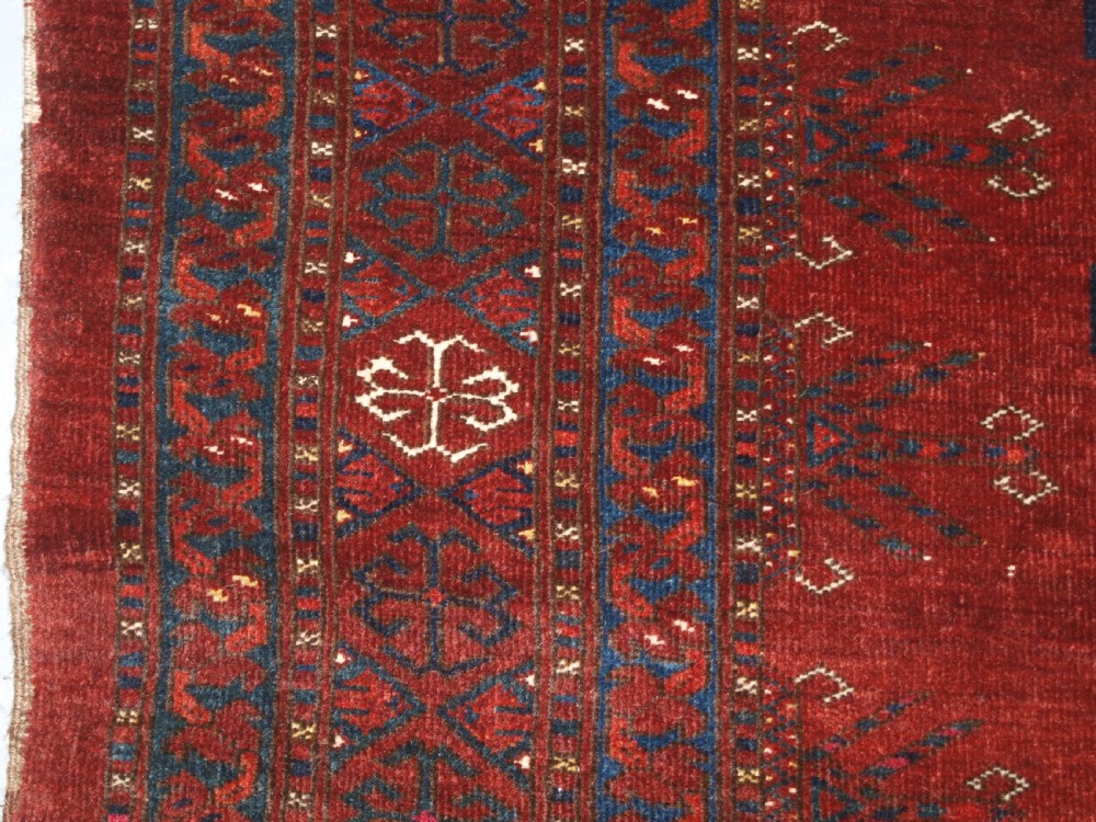 ANTIQUE ERSARI TURKMEN CHUVAL WITH 15 GULS AND GOOD TREE ELEM DESIGN, CIRCA 1900. View VI