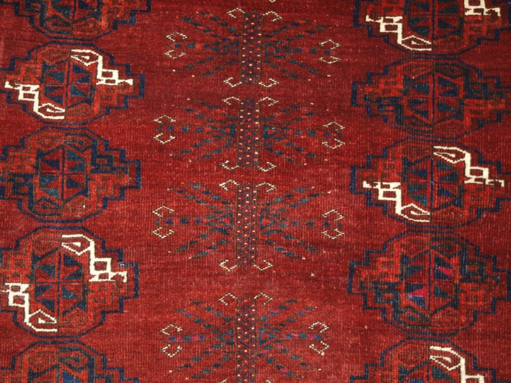 ANTIQUE ERSARI TURKMEN CHUVAL WITH 15 GULS AND GOOD TREE ELEM DESIGN, CIRCA 1900. View VII