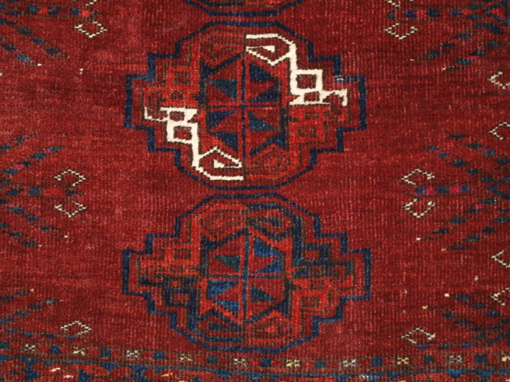 ANTIQUE ERSARI TURKMEN CHUVAL WITH 15 GULS AND GOOD TREE ELEM DESIGN, CIRCA 1900. View VIII