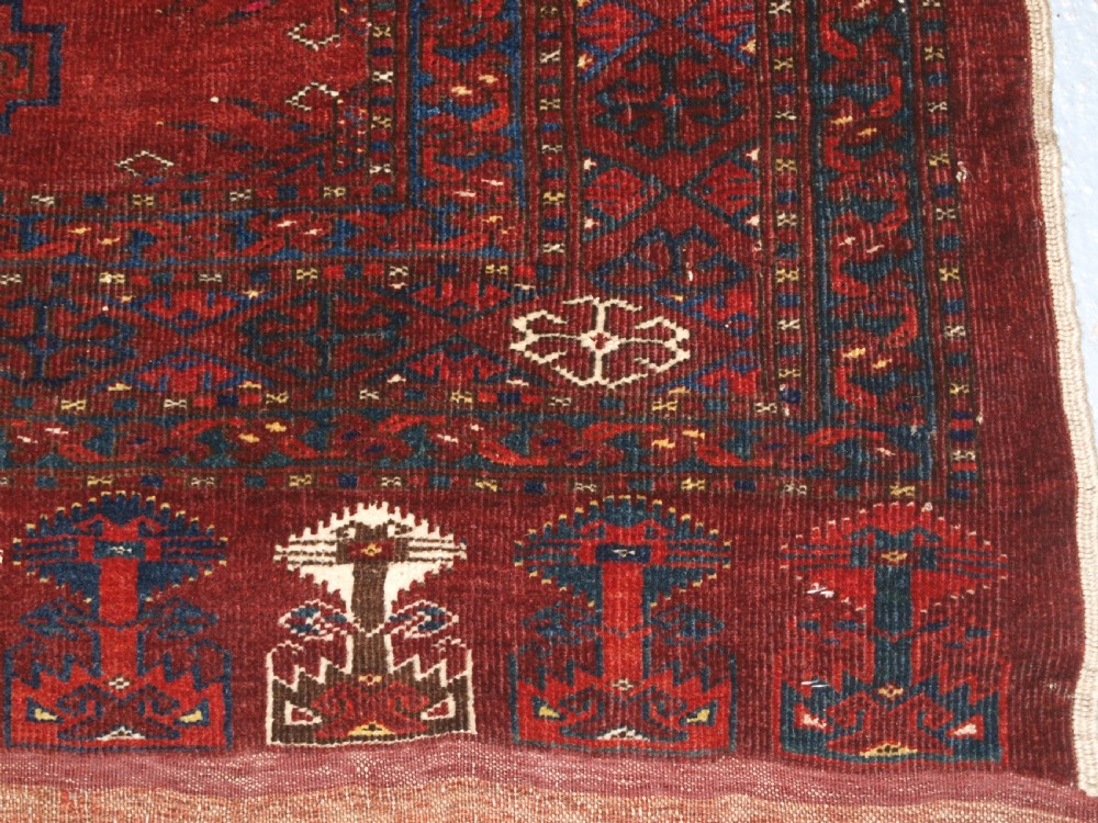 ANTIQUE ERSARI TURKMEN CHUVAL WITH 15 GULS AND GOOD TREE ELEM DESIGN, CIRCA 1900. View X