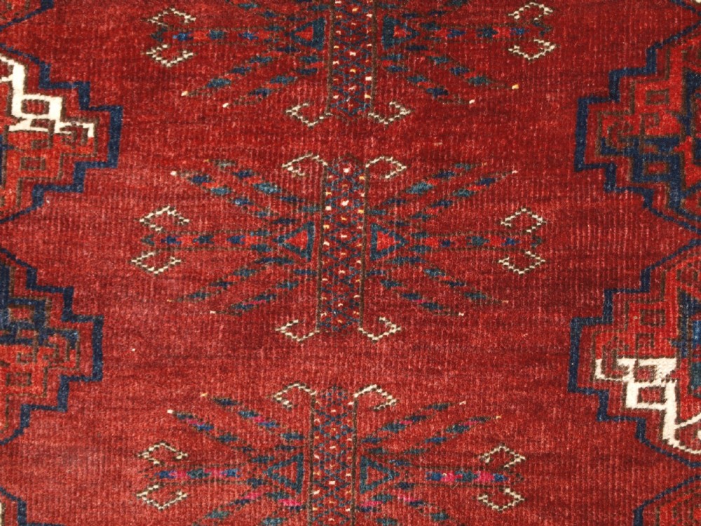 ANTIQUE ERSARI TURKMEN CHUVAL WITH 15 GULS AND GOOD TREE ELEM DESIGN, CIRCA 1900. View XIII