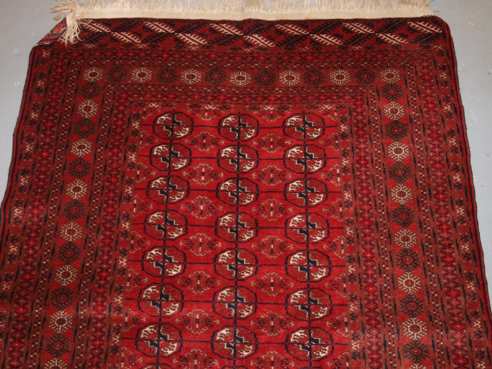 OLD AFGHAN VILLAGE RUG, VERY FINE WEAVE, TEKKE TURKMEN DESIGN, CIRCA 1920. View II