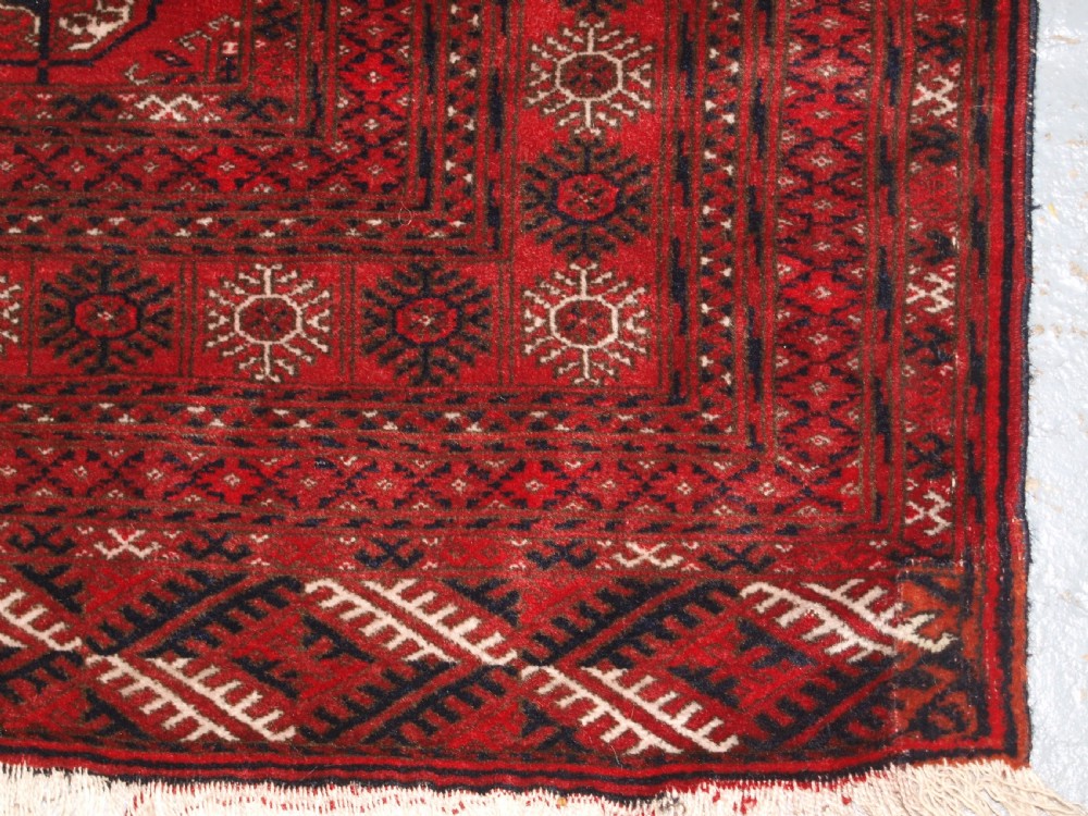 OLD AFGHAN VILLAGE RUG, VERY FINE WEAVE, TEKKE TURKMEN DESIGN, CIRCA 1920. View X