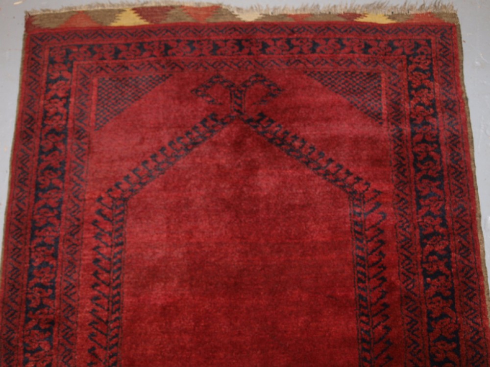 OLD AFGHAN VILLAGE PRAYER RUG WITH RAMS HORN DESIGN, OUTSTANDING EXAMPLE, CIRCA 1920. View II