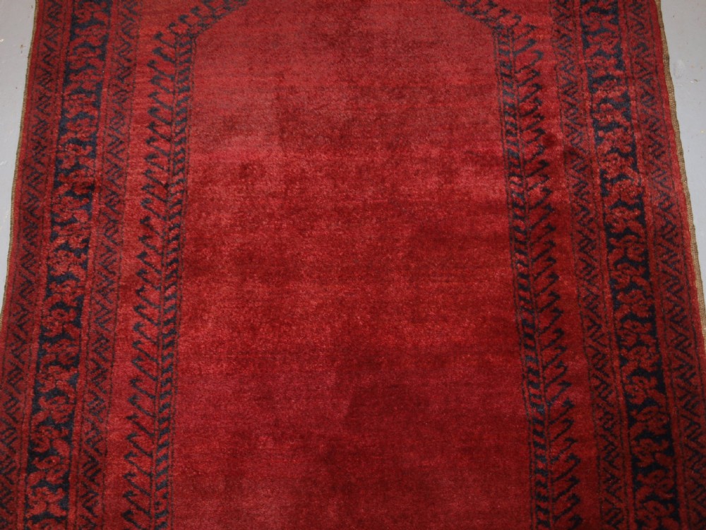 OLD AFGHAN VILLAGE PRAYER RUG WITH RAMS HORN DESIGN, OUTSTANDING EXAMPLE, CIRCA 1920. View III