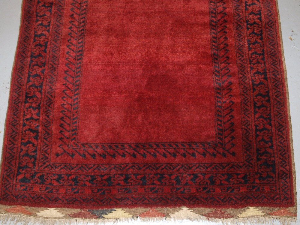 OLD AFGHAN VILLAGE PRAYER RUG WITH RAMS HORN DESIGN, OUTSTANDING EXAMPLE, CIRCA 1920. View IV