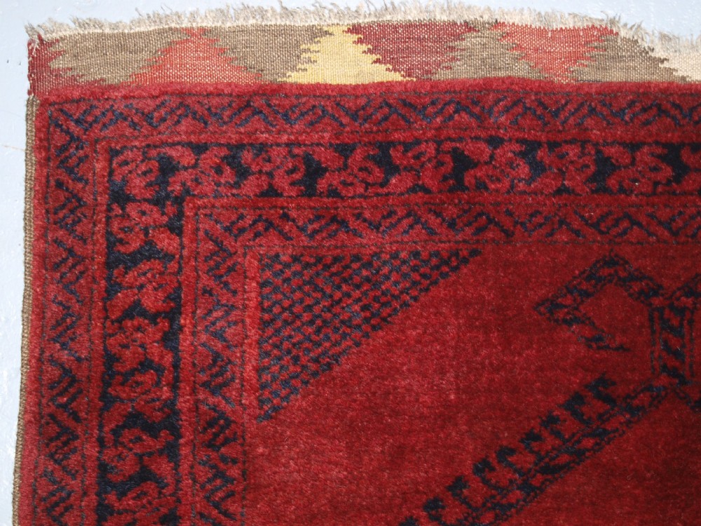 OLD AFGHAN VILLAGE PRAYER RUG WITH RAMS HORN DESIGN, OUTSTANDING EXAMPLE, CIRCA 1920. View V