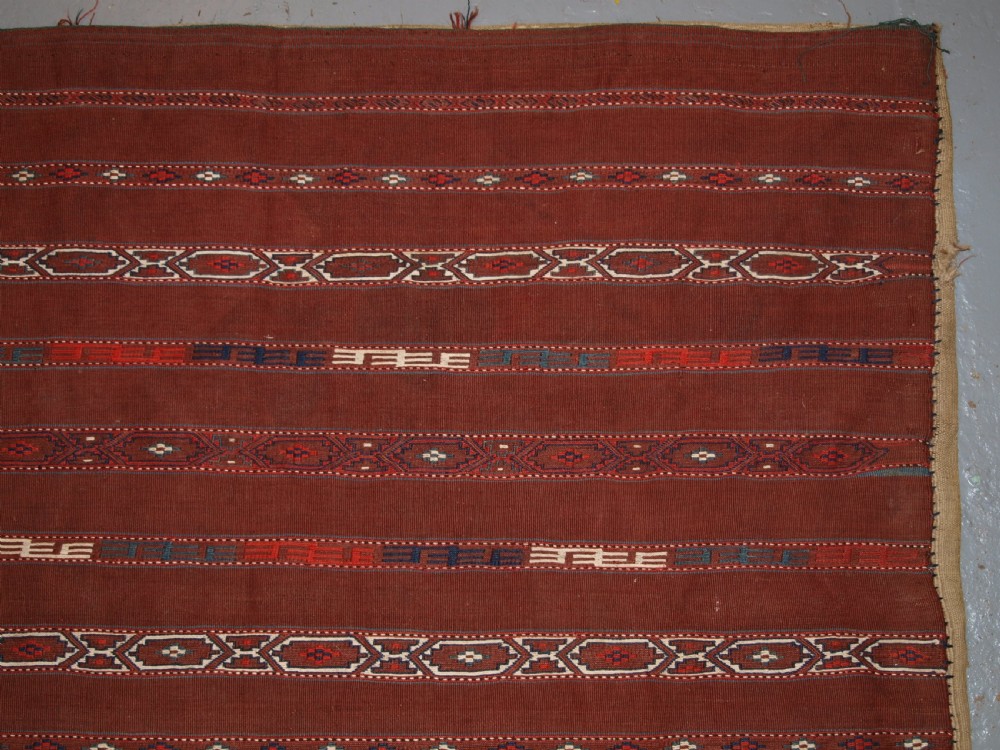 ANTIQUE TEKKE TURKMEN BANDED FLAT WOVEN CHUVAL, COMPLETE WITH BACK, CIRCA 1900. View II